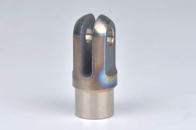 Titanium clevis for motorsport and racing use