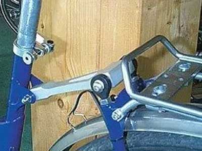 plastic rod end on bicycle rear swing arm